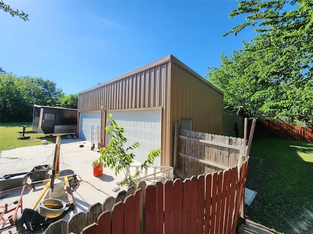 detached garage with fence