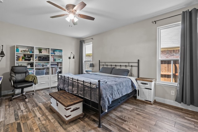 9112 Manassas Rdg, Mckinney, TX 75071 - bedroom featuring wood finished floors, ceiling fan, and baseboards
