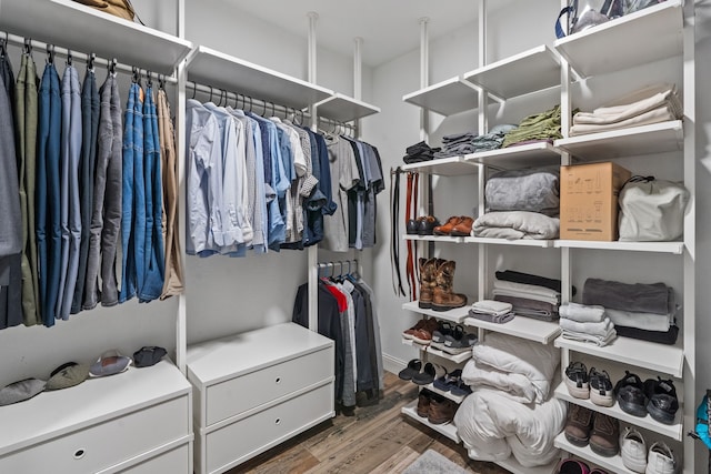 9112 Manassas Rdg, Mckinney, TX 75071 - spacious closet with wood finished floors