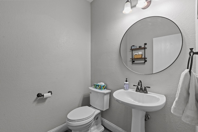 9112 Manassas Rdg, Mckinney, TX 75071 - half bath featuring toilet and baseboards
