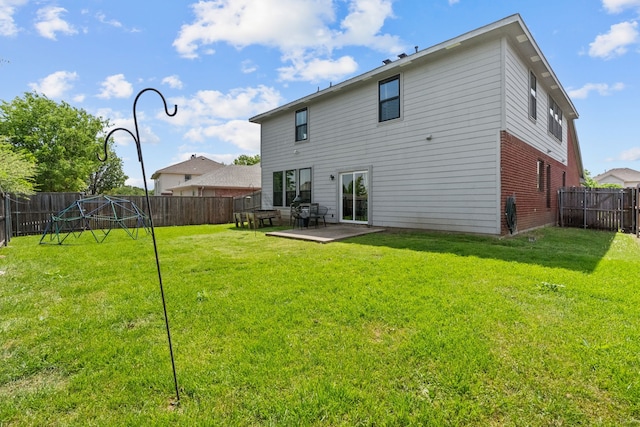 9112 Manassas Rdg, Mckinney, TX 75071 - back of house with brick siding and a patio area