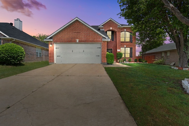 9112 Manassas Rdg, Mckinney, TX 75071 - traditional-style home with brick siding, a front yard, driveway, and a garage