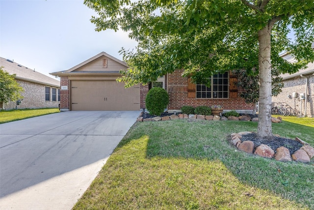 view of front of property featuring an attached garage, a front lawn, brick siding, and concrete driveway