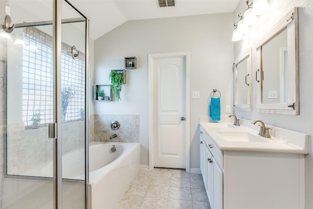 full bath with a shower stall, a garden tub, a sink, and double vanity