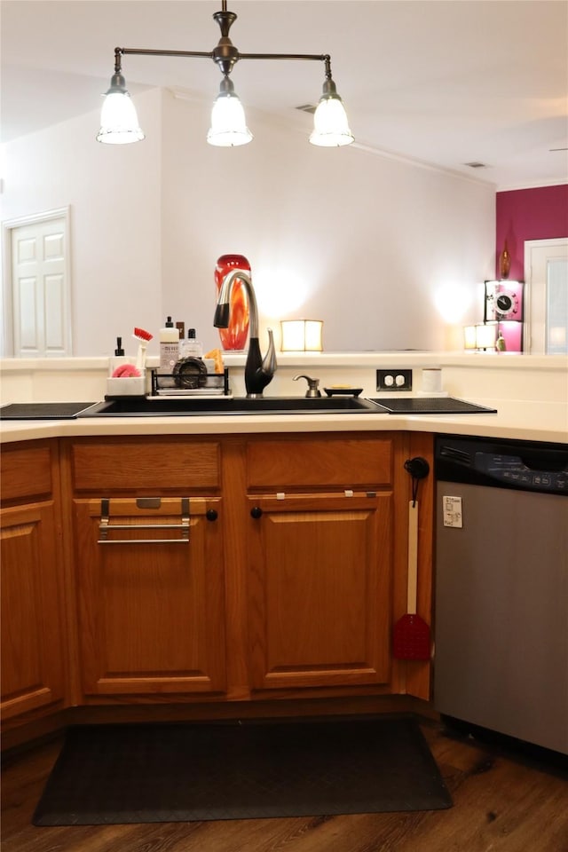 103 Sunglow Loop, Red Oak, TX 75154 - kitchen featuring stainless steel dishwasher, a sink, brown cabinetry, light countertops, and dark wood-style flooring