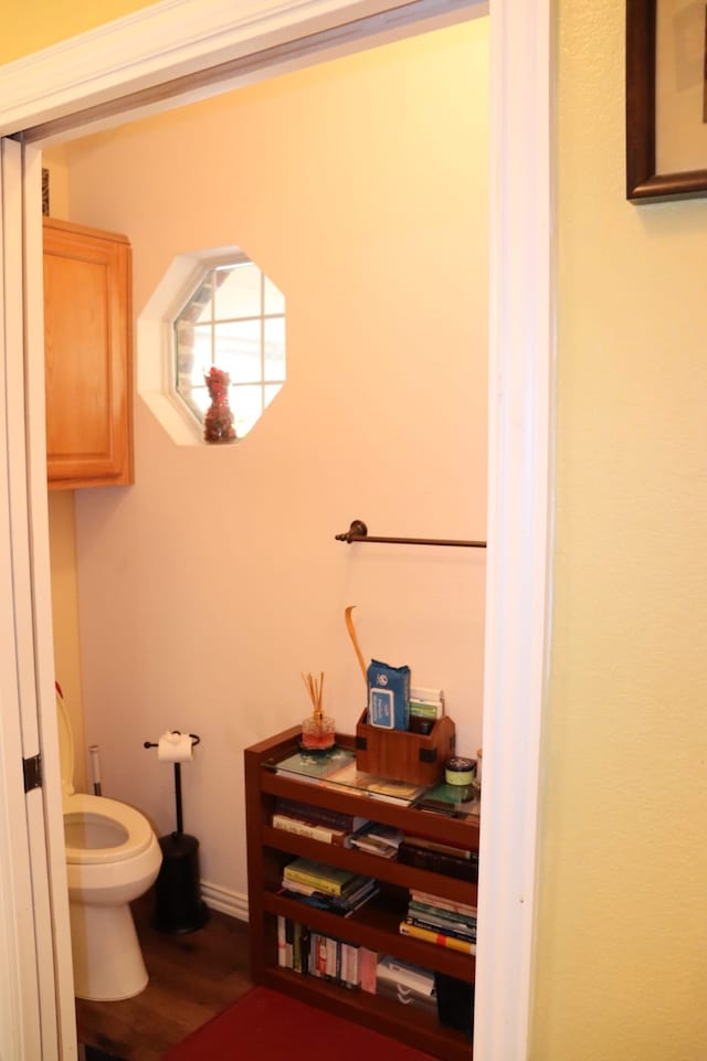 103 Sunglow Loop, Red Oak, TX 75154 - bathroom featuring wood finished floors and toilet