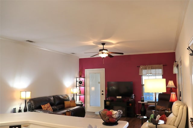 103 Sunglow Loop, Red Oak, TX 75154 - living area featuring visible vents, a ceiling fan, wood finished floors, and crown molding