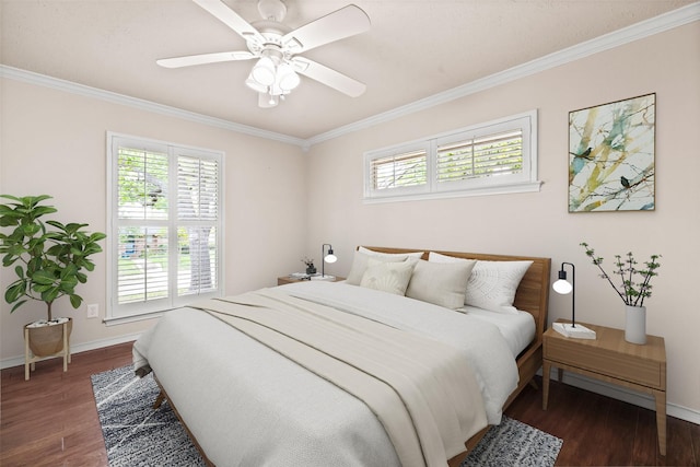 bedroom with ceiling fan, wood finished floors, baseboards, and ornamental molding