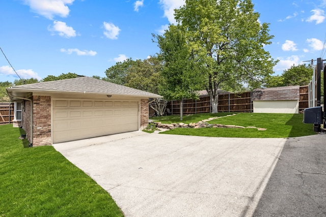detached garage featuring fence