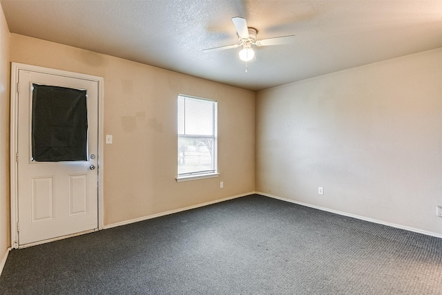 2545 E Renfro St, Burleson, TX 76028 - spare room featuring dark carpet, ceiling fan, and baseboards