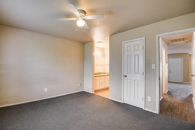 2545 E Renfro St, Burleson, TX 76028 - unfurnished bedroom featuring baseboards, visible vents, light colored carpet, and connected bathroom