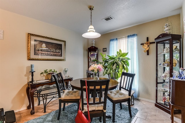 2545 E Renfro St, Burleson, TX 76028 - dining area with visible vents and baseboards