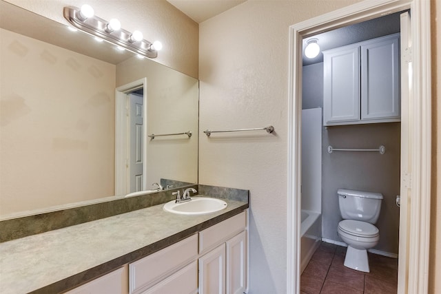 2545 E Renfro St, Burleson, TX 76028 - full bathroom featuring toilet, a washtub, walk in shower, tile patterned flooring, and vanity
