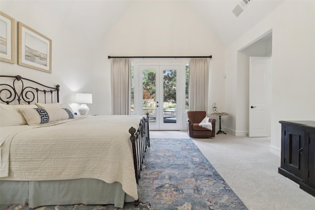 carpeted bedroom featuring vaulted ceiling, french doors, access to outside, and baseboards