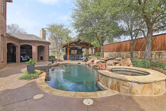 view of swimming pool featuring a fenced in pool, a gazebo, a patio area, and fence
