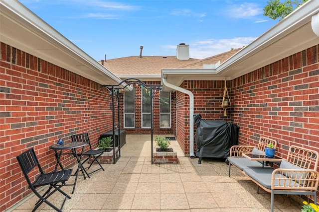 view of patio / terrace featuring a grill