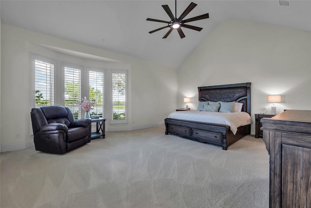 carpeted bedroom with vaulted ceiling, baseboards, and a ceiling fan