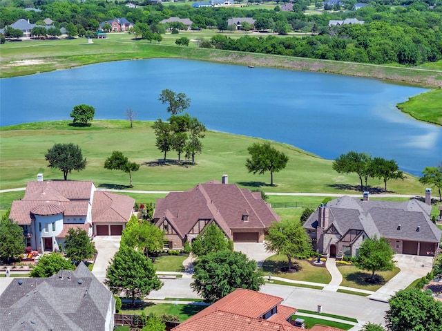 birds eye view of property featuring golf course view, a residential view, and a water view