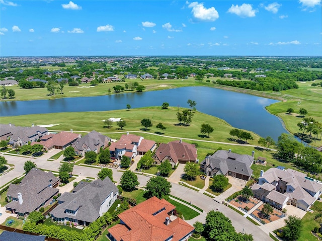 aerial view featuring view of golf course, a water view, and a residential view