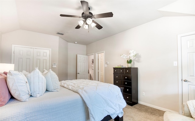 8741 Bigelow Dr, Plano, TX 75024 - bedroom with lofted ceiling, light colored carpet, baseboards, a ceiling fan, and a closet