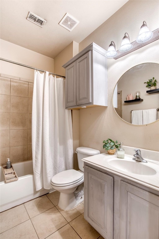 8741 Bigelow Dr, Plano, TX 75024 - bathroom featuring toilet, tile patterned flooring, vanity, and shower / bath combination with curtain