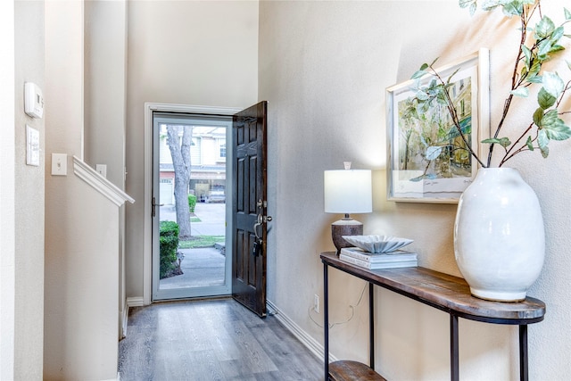 8741 Bigelow Dr, Plano, TX 75024 - entryway with wood finished floors and baseboards
