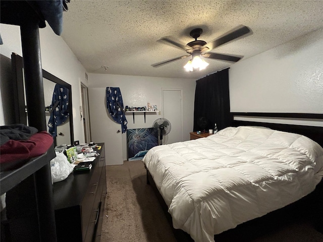 612 Ridgeline Dr, Hurst, TX 76053 - carpeted bedroom featuring a textured ceiling and a ceiling fan