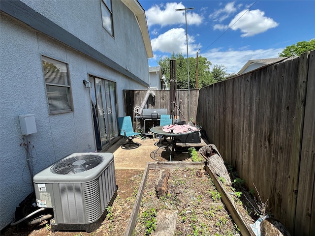 612 Ridgeline Dr, Hurst, TX 76053 - fenced backyard with central air condition unit and a patio