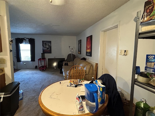 612 Ridgeline Dr, Hurst, TX 76053 - dining space featuring a textured ceiling and carpet floors
