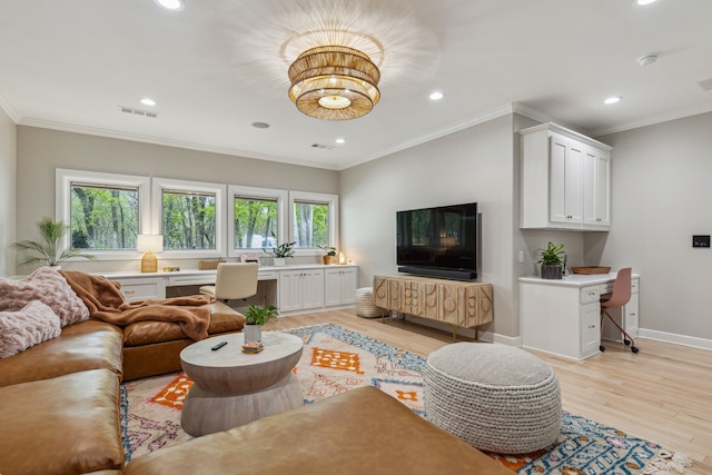 living area featuring recessed lighting, light wood-style flooring, visible vents, and built in desk
