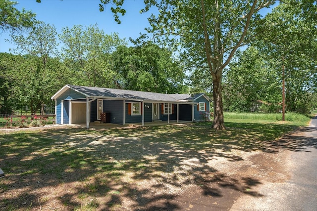 view of front facade featuring a carport and a porch