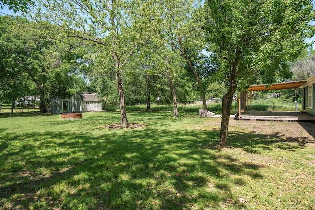 view of yard with a deck