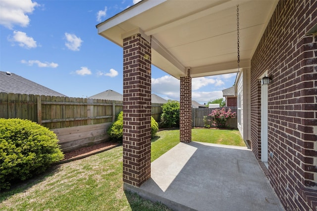 view of yard featuring a fenced backyard and a patio