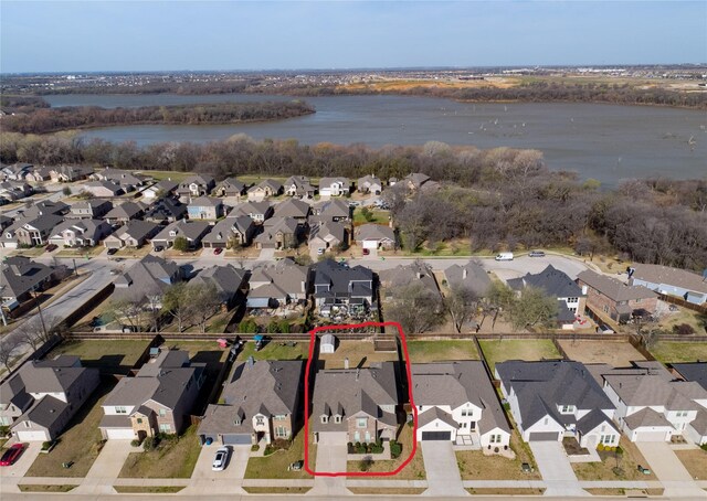 916 Sunset Haven Dr, Little Elm, TX 75068 - aerial view of residential area with a nearby body of water and property parcel outlined