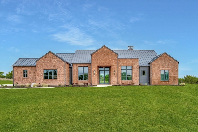 2016 Meadowlark, Aledo, TX 76008 - view of front of home with a standing seam roof, a front lawn, and metal roof