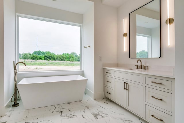 2016 Meadowlark, Aledo, TX 76008 - full bathroom featuring marble finish floor, a wealth of natural light, vanity, and a freestanding bath
