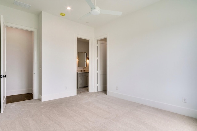2016 Meadowlark, Aledo, TX 76008 - unfurnished bedroom featuring visible vents, baseboards, light carpet, and ensuite bathroom