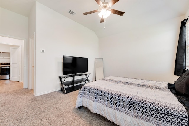 bedroom featuring a ceiling fan, light carpet, baseboards, lofted ceiling, and visible vents
