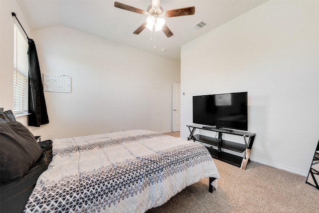 bedroom with a ceiling fan, baseboards, light colored carpet, lofted ceiling, and visible vents