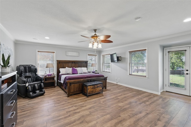 bedroom featuring a ceiling fan, crown molding, light wood finished floors, baseboards, and access to exterior