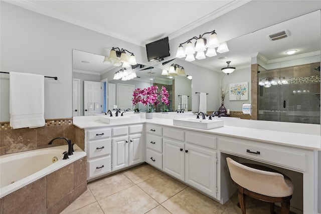 full bath featuring crown molding, a sink, a stall shower, a jetted tub, and tile patterned flooring