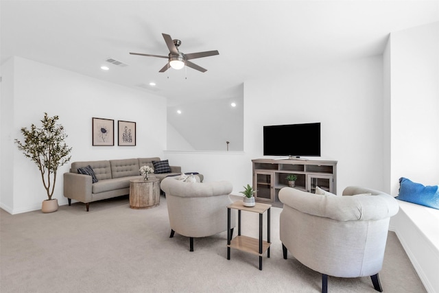 living room featuring recessed lighting, visible vents, a ceiling fan, and light colored carpet