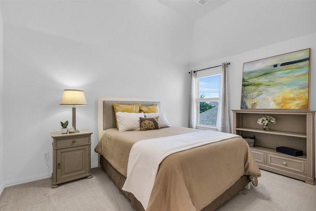 bedroom featuring high vaulted ceiling, light carpet, and baseboards