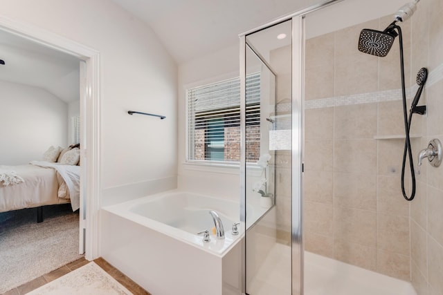 11225 Klondike Ln, Aubrey, TX 76227 - ensuite bathroom featuring a stall shower, lofted ceiling, connected bathroom, and a bath