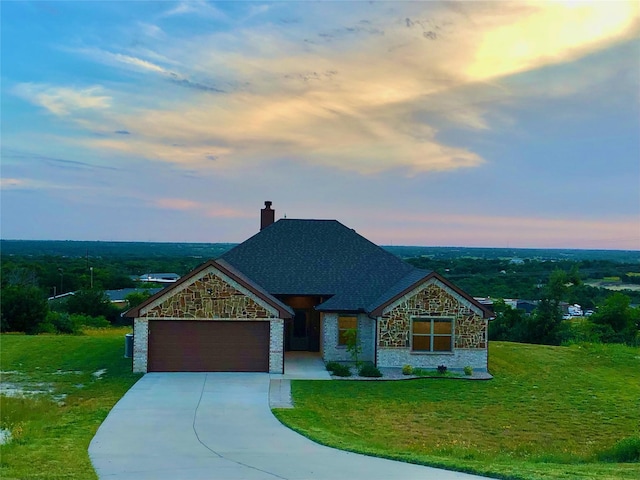 217 Timber Valley Ct, Weatherford, TX 76085 - view of front of home featuring a garage, driveway, stone siding, a chimney, and a front lawn