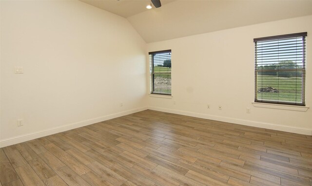 217 Timber Valley Ct, Weatherford, TX 76085 - empty room featuring a ceiling fan, wood finished floors, lofted ceiling, and baseboards