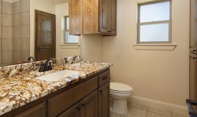 217 Timber Valley Ct, Weatherford, TX 76085 - bathroom featuring toilet, tile patterned floors, vanity, and baseboards