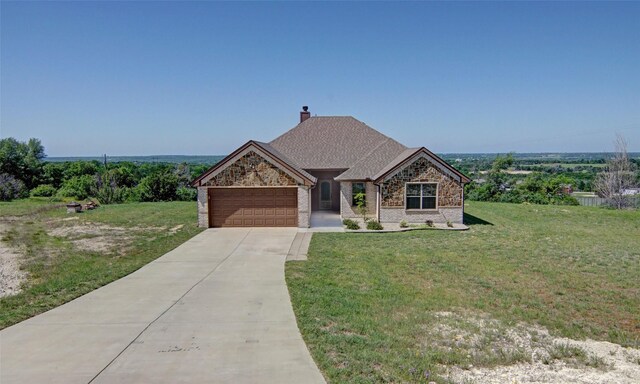 217 Timber Valley Ct, Weatherford, TX 76085 - view of front of property featuring a garage, driveway, a front yard, a chimney, and brick siding