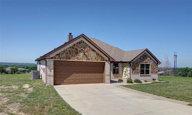 217 Timber Valley Ct, Weatherford, TX 76085 - view of front of home with an attached garage, a chimney, concrete driveway, a front yard, and stone siding