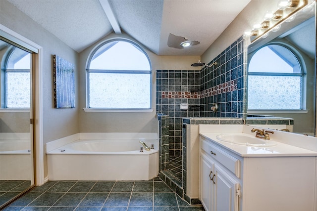 full bathroom with a textured ceiling, a bath, vanity, a tile shower, and lofted ceiling